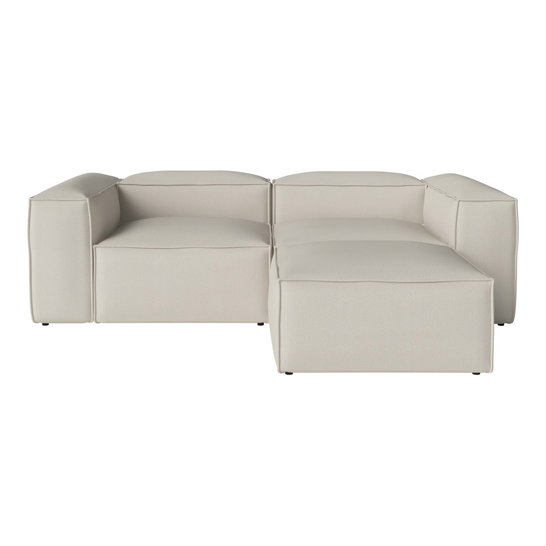 Modern beige sectional sofa with clean lines and a minimalist design. Perfect for contemporary living spaces.