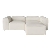 Modern white sectional sofa with clean lines and a minimalist design, perfect for a contemporary living space.