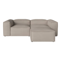 Beige modern sectional sofa with smooth, minimalist design and no visible patterns, perfect for contemporary living spaces.