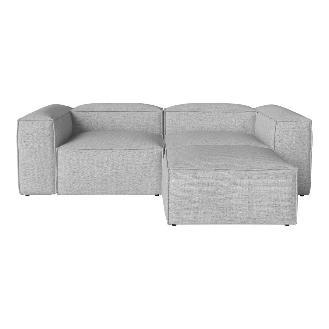 Gray modular sofa with a modern, minimalist design and smooth, textured fabric upholstery.