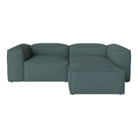 Teal sectional sofa with a modern, solid pattern, featuring clean lines and a contemporary design.
