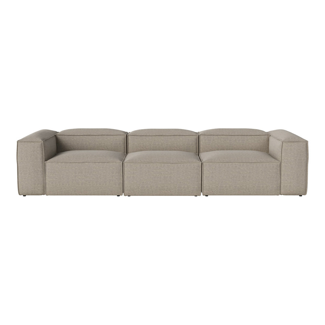 Beige modular sofa with a textured weave and minimal pattern, offering a modern and stylish look for any living space.