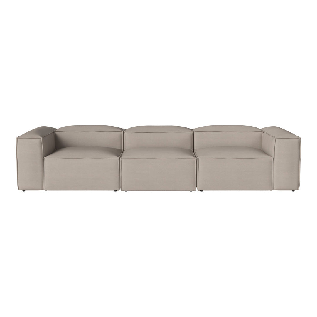 Beige modular sofa with a sleek, minimalist design and smooth fabric texture. Ideal for modern living spaces.