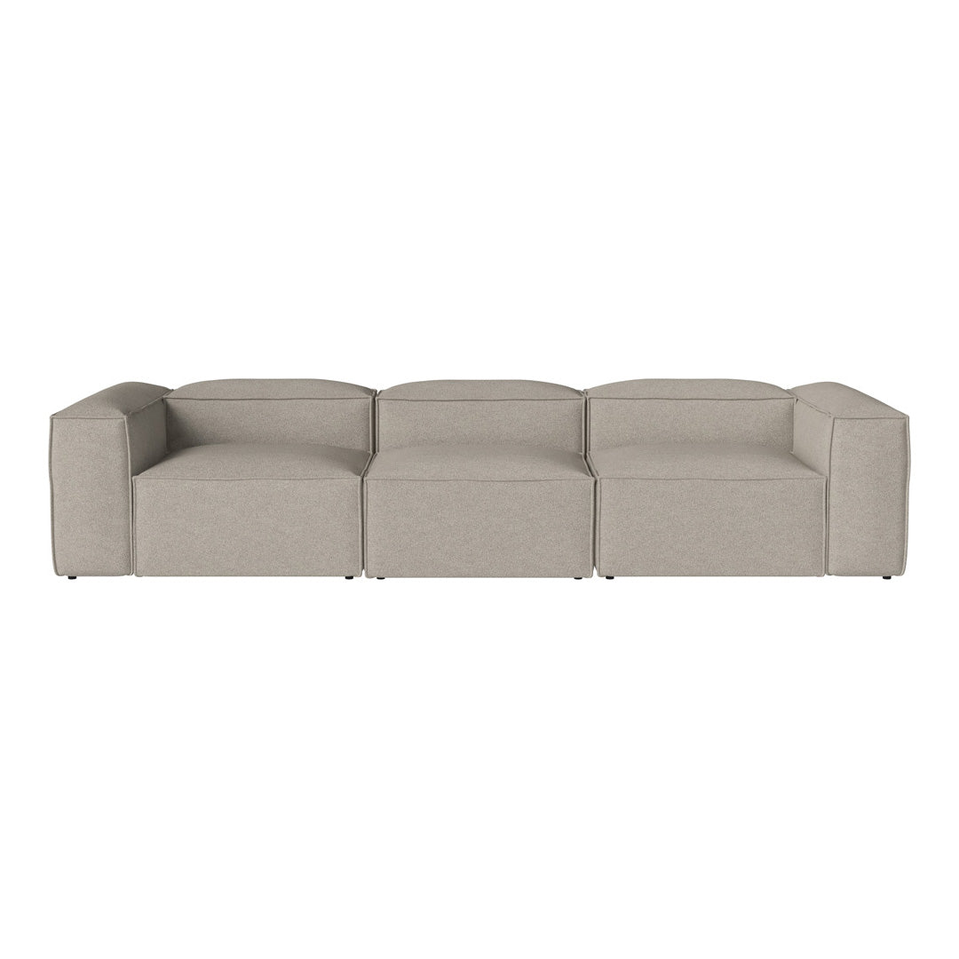 Beige modular sofa with a modern, solid color design and clean lines, perfect for contemporary living spaces.