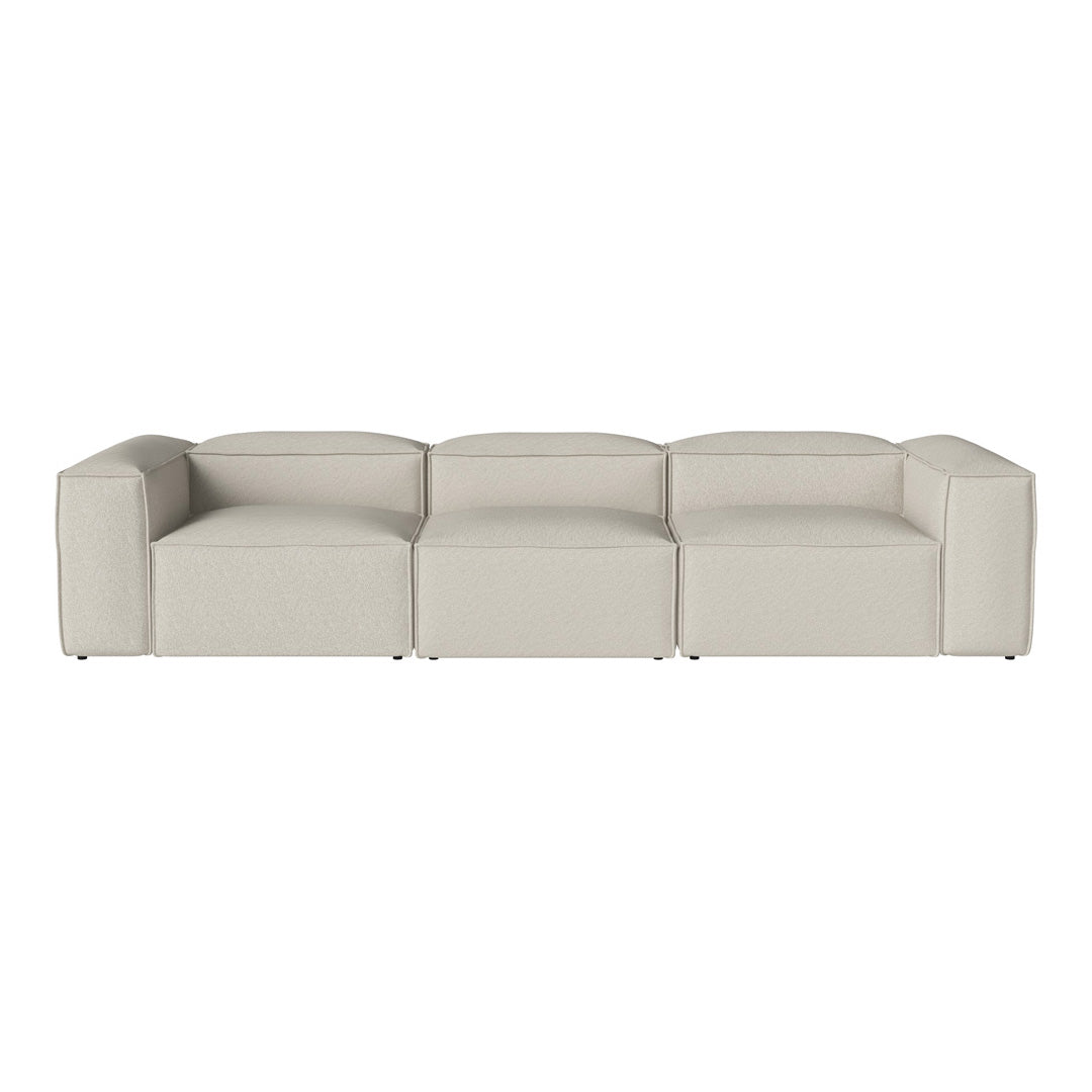Light gray modular sofa with a minimalist design and smooth, clean lines, ideal for contemporary interiors.