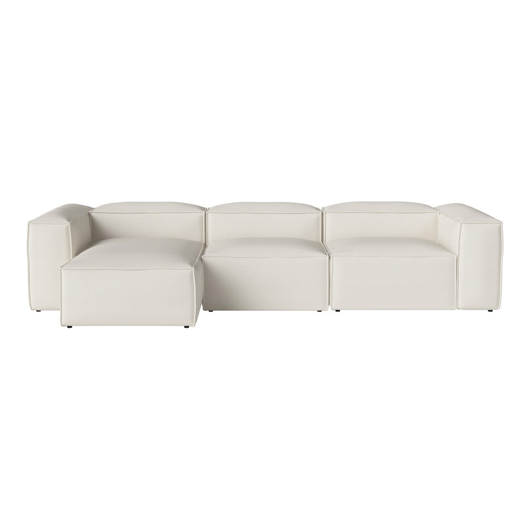 Modern sectional sofa in soft white upholstery, featuring a sleek, minimalist design and clean lines.