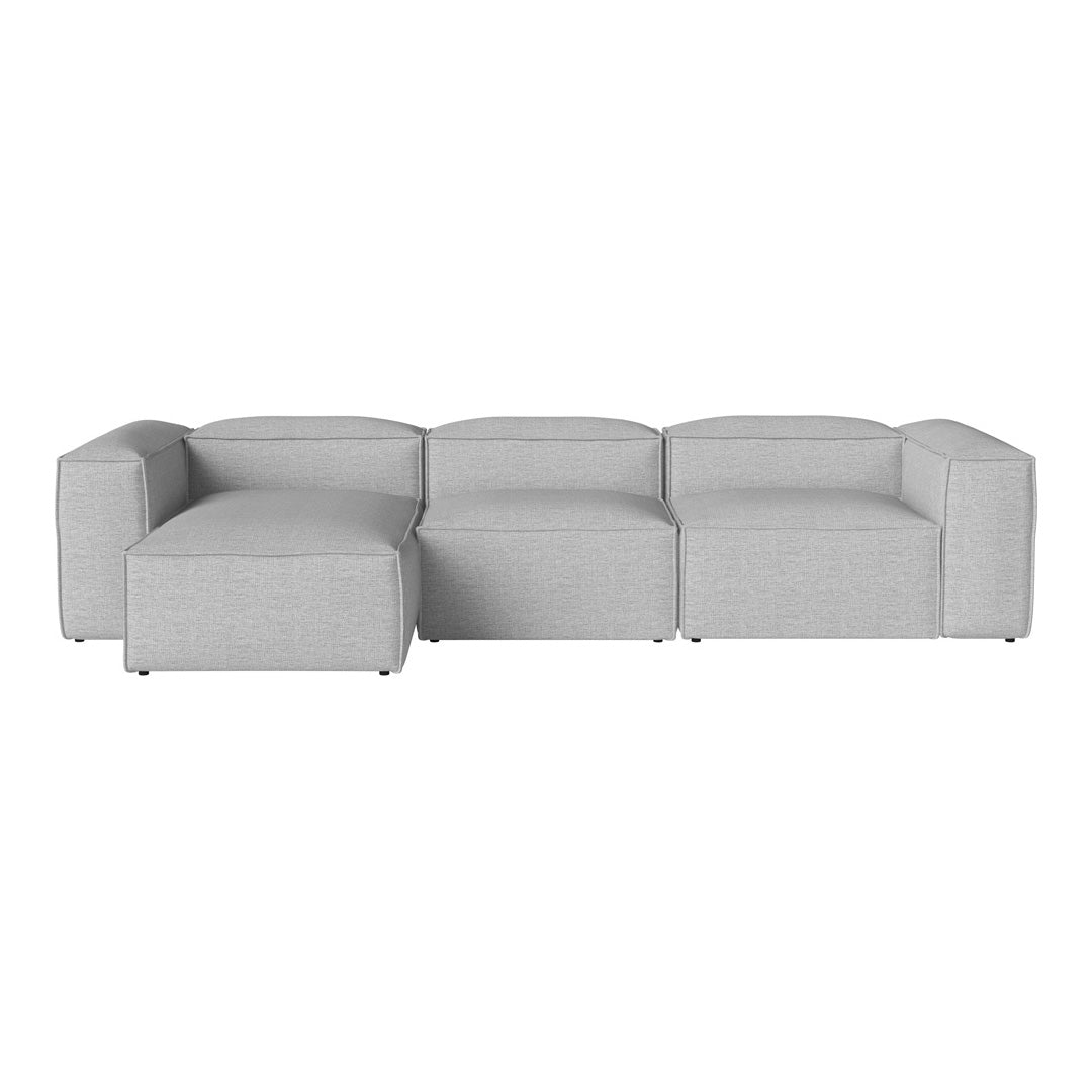 Light gray sectional sofa with a modern, minimalist design and smooth, uniform pattern. Perfect for contemporary spaces.