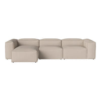 Beige modular sofa with clean lines and a minimalist design, featuring a smooth, solid color upholstery.
