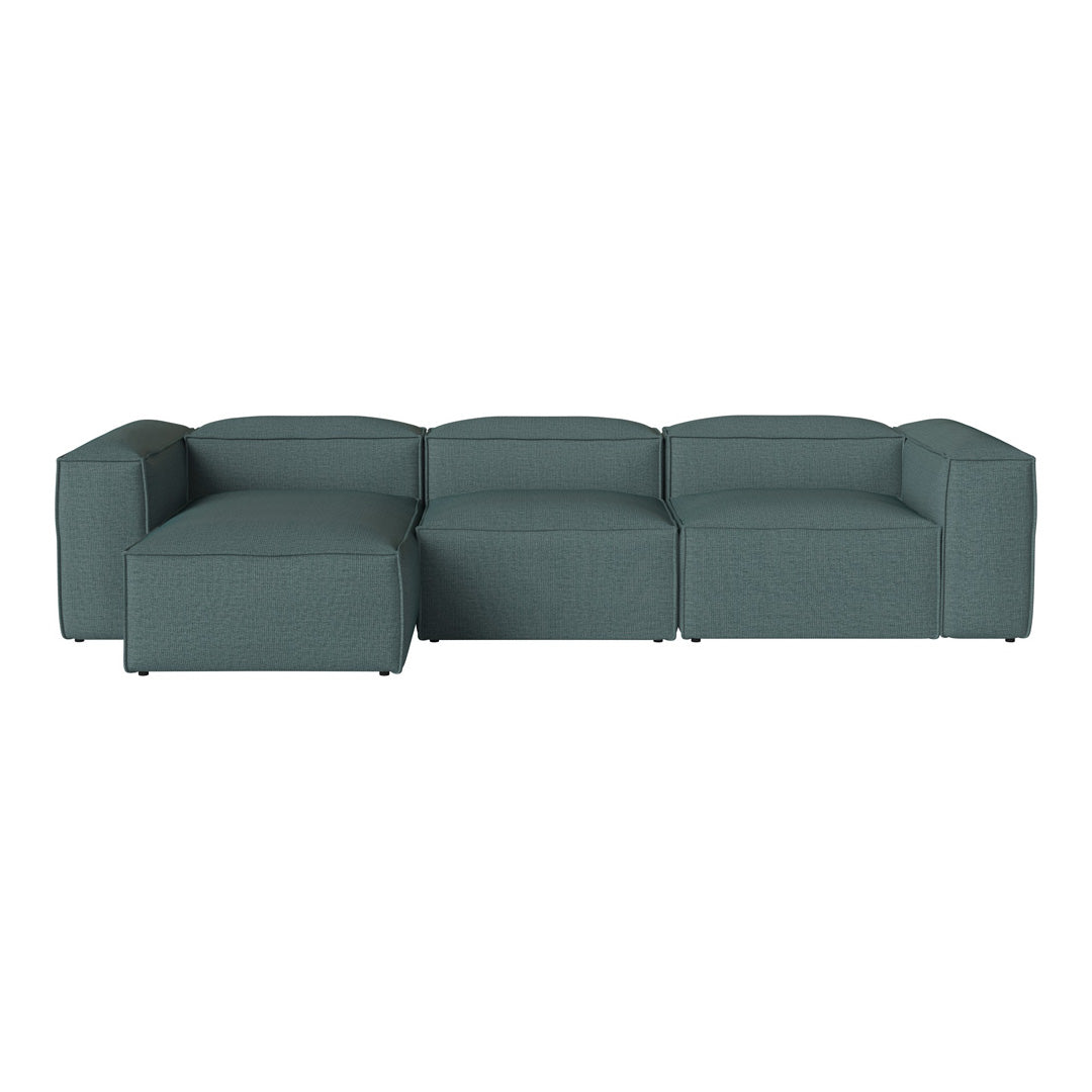 Teal sectional sofa with a sleek, minimalist design and soft, textured fabric. Perfect for modern living spaces.