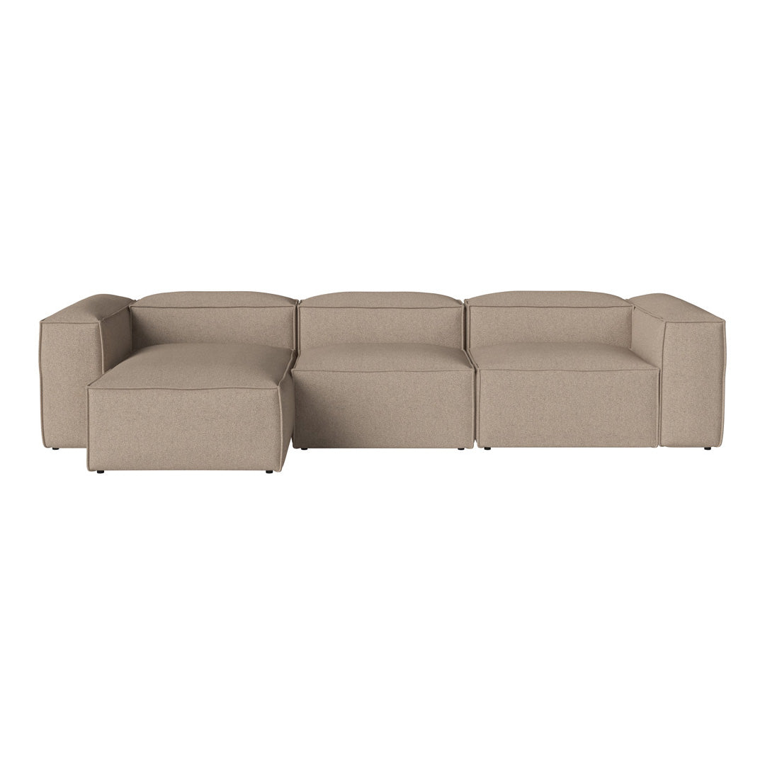 Beige sectional sofa with a modern, minimalist design and soft, textured fabric. Ideal for contemporary living spaces.