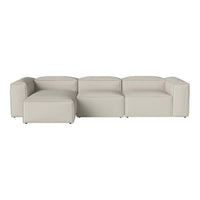Light beige modular sofa with a smooth, minimalist design and clean lines, perfect for modern decor.