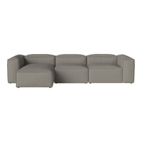 Modern gray sectional sofa with a clean, minimalist design and smooth fabric texture. Ideal for contemporary interiors.