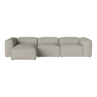 Neutral beige sectional sofa with a minimalist design and smooth, sleek lines for a modern aesthetic.