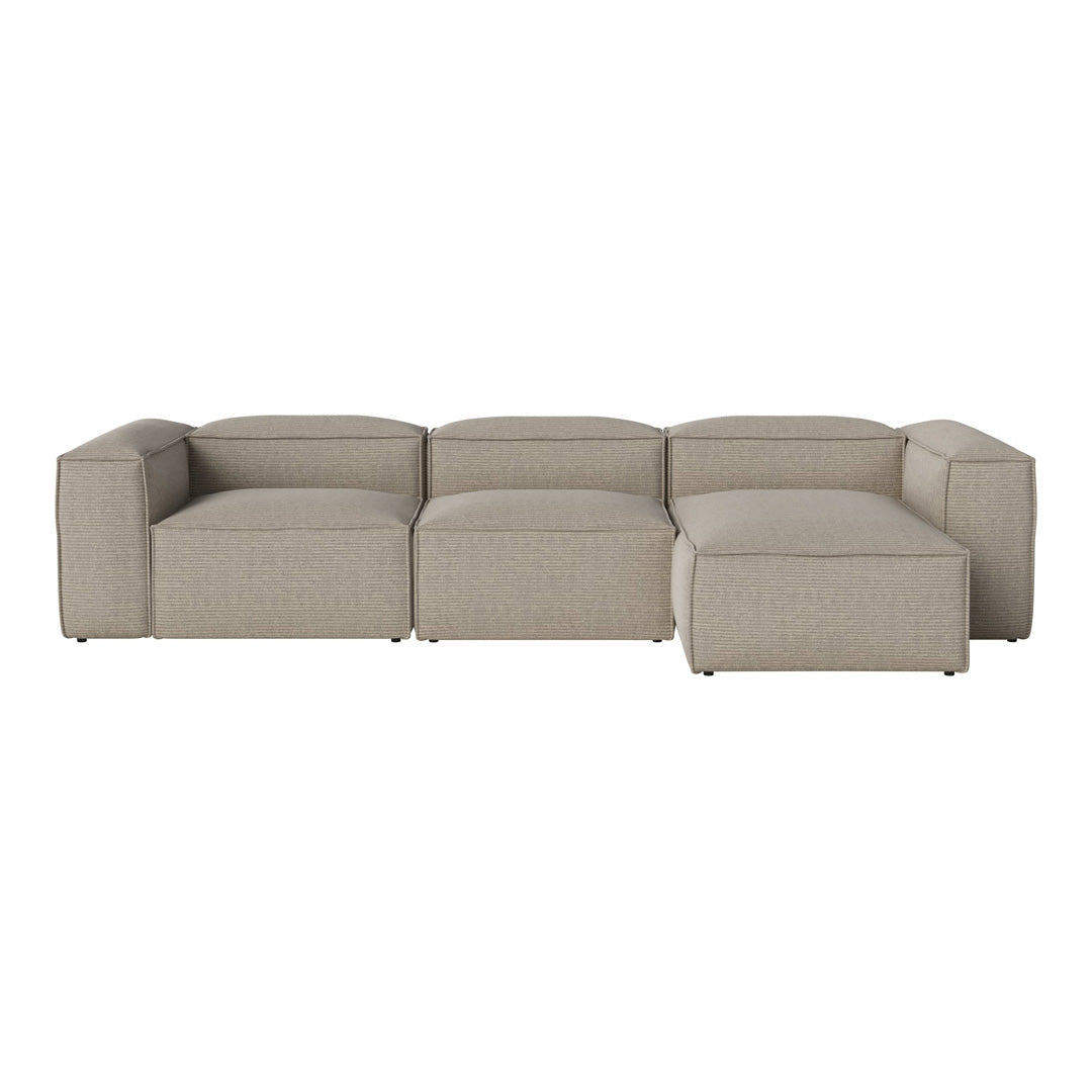 Beige sectional sofa with modern square design and subtle texture, perfect for stylish living spaces.