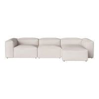 Modern modular sofa in soft white upholstery with a sleek, minimalist design and geometric shapes.