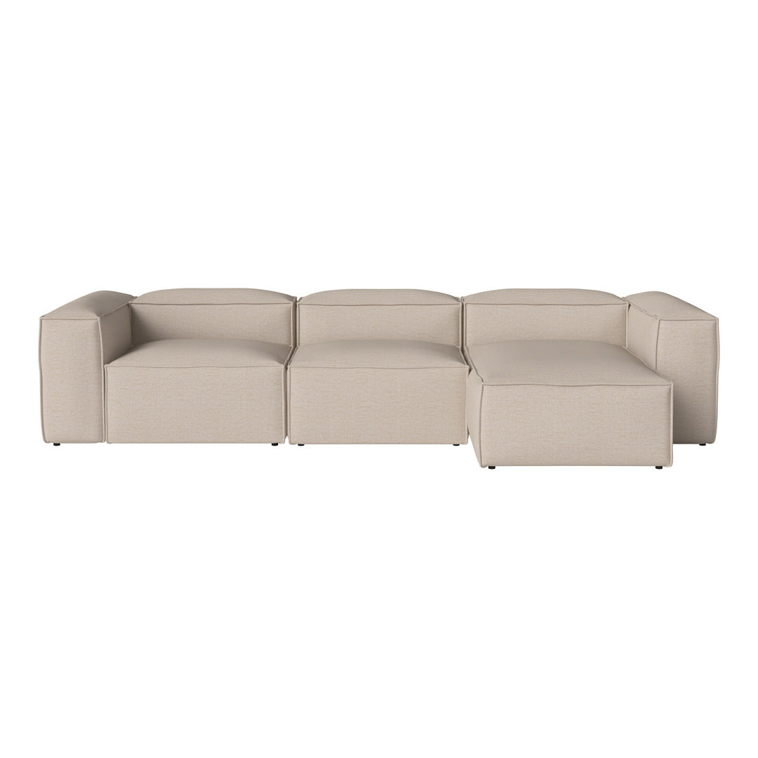 Beige modular sofa with clean lines and a modern design, featuring a solid color and no visible patterns.