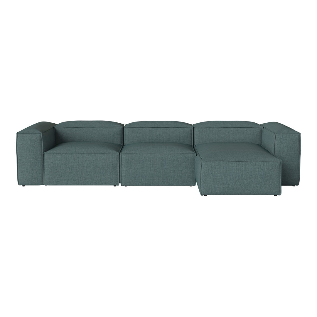 Teal sectional sofa with a clean, modern design and smooth, solid fabric upholstery. Perfect for contemporary spaces.