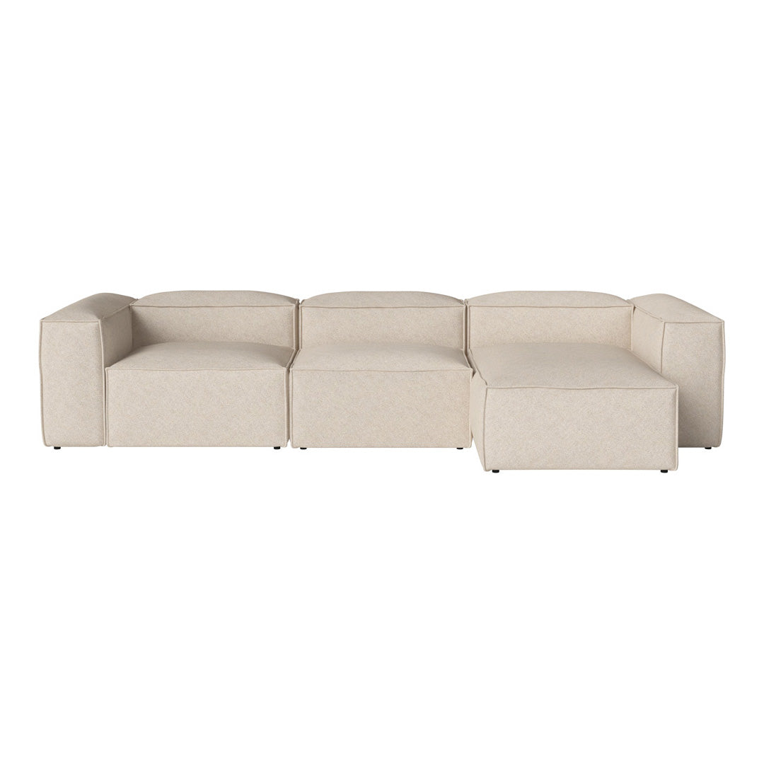 Beige modular sofa with a minimalist design, featuring clean lines and a textured fabric finish. Ideal for modern spaces.