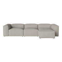 Gray sectional sofa with a smooth, minimalist design and subtle, modern lines. Perfect for contemporary interiors.