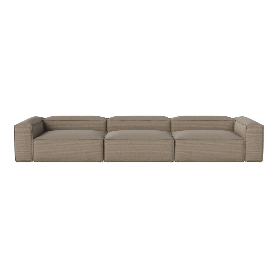 Beige modular sofa with a smooth, textured fabric and minimalist design, perfect for modern living spaces.