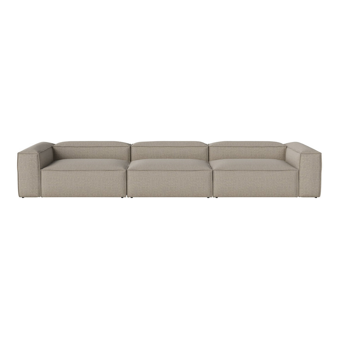 Light beige sectional sofa with a textured, modern design and clean lines, perfect for contemporary decor.