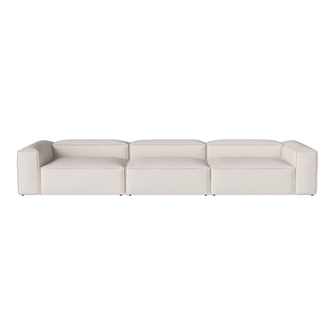 Modern white sectional sofa with sleek lines and minimalistic design, perfect for contemporary decor.