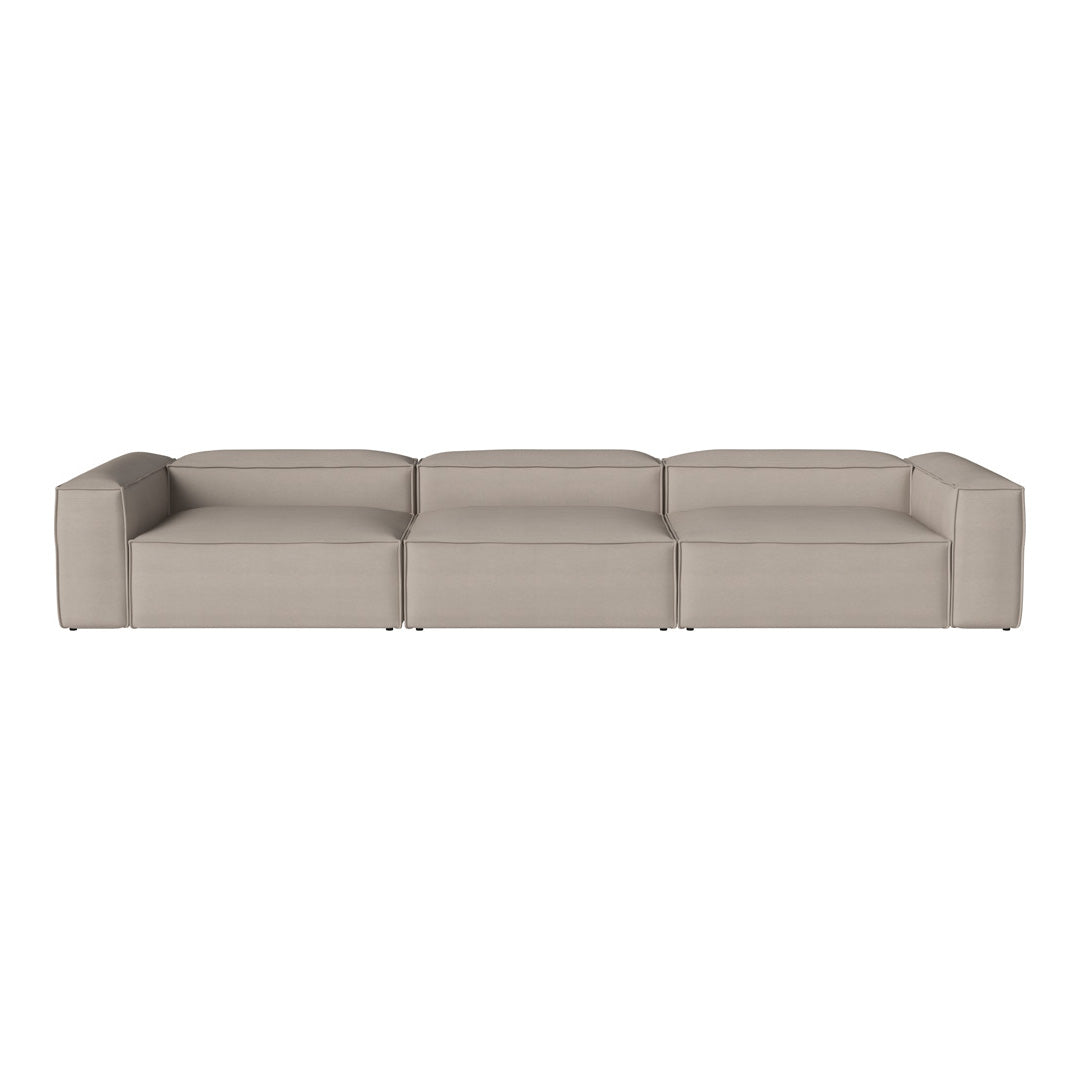 Beige sectional sofa with a sleek, modern design and smooth, minimalistic lines. Perfect for contemporary spaces.