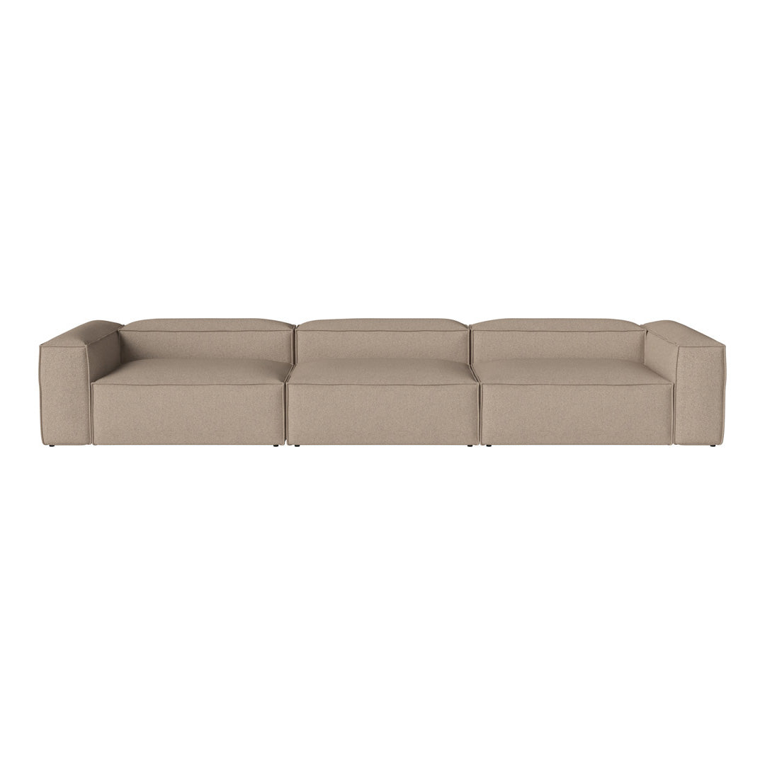 Beige modular sofa with minimalist design and smooth texture, perfect for modern interiors.