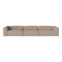 Beige modular sofa with minimalist design and smooth texture, perfect for modern interiors.