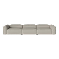 Minimalist beige sectional sofa with sleek lines and smooth texture, perfect for modern decor.