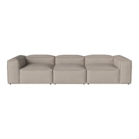 Beige modular sofa with a smooth, minimalist design and clean lines, perfect for modern living spaces.