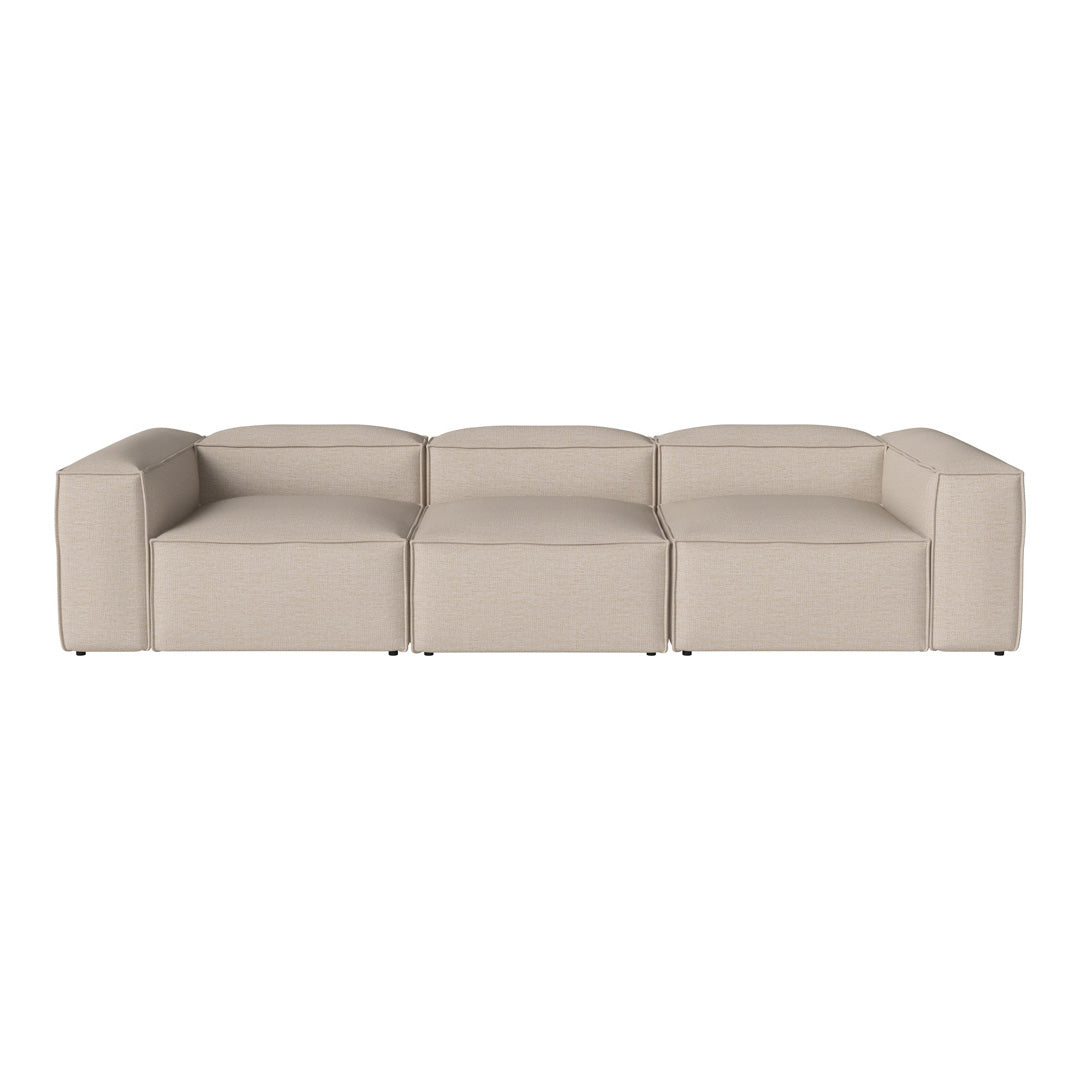 Beige modular sofa with a smooth, minimalist design and clean lines, perfect for modern living spaces.