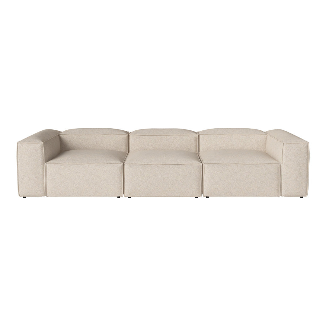 Beige modular sofa with a smooth, textured fabric, featuring a minimalist design and sleek lines. Perfect for modern decor.