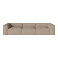 Beige modular sofa with a minimalist design and smooth, textured fabric. Modern style for contemporary living spaces.
