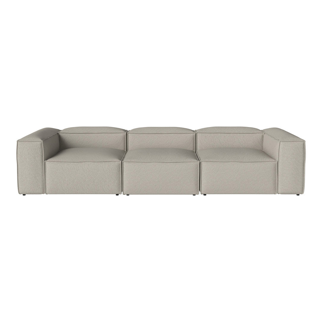 "Contemporary light gray modular sofa with clean lines and a minimalist design."