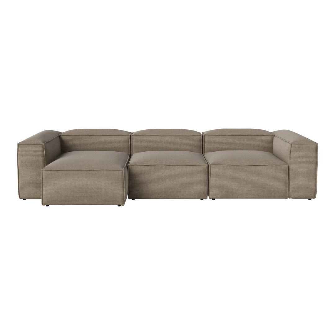 Modern sectional sofa in a warm taupe hue with soft, textured fabric and clean lines for a minimalist aesthetic.