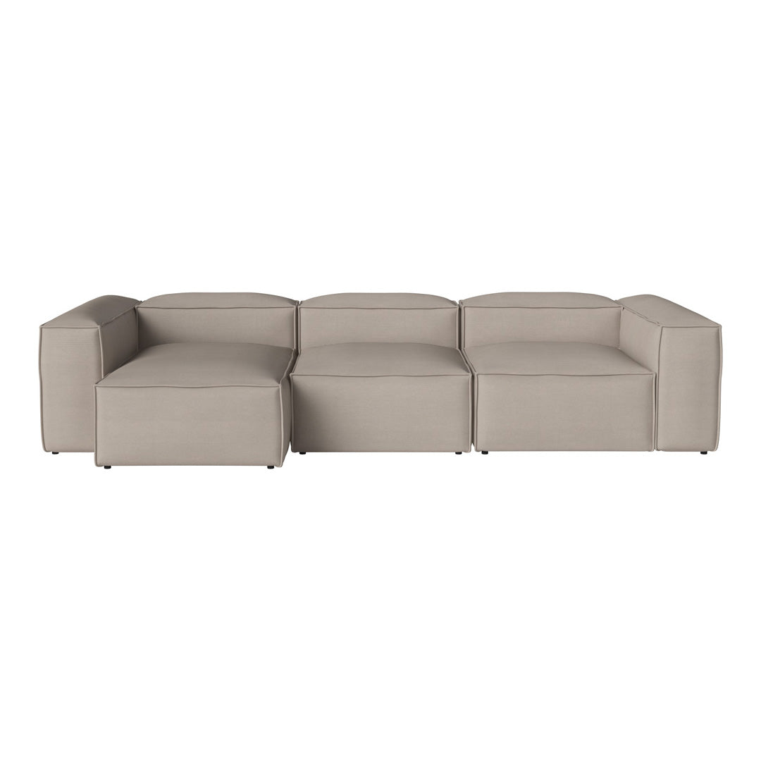 Beige modular sofa with a sleek, modern design and smooth, textured upholstery. Versatile and stylish addition to any space.