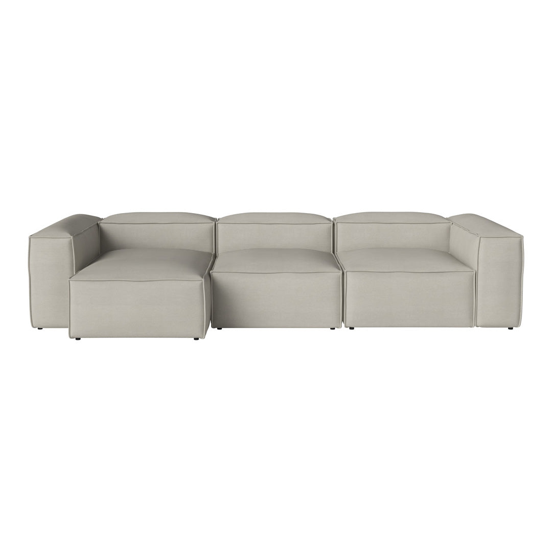 "Light gray modular sofa with a smooth, modern design and clean lines."