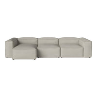"Light gray modular sofa with a smooth, modern design and clean lines."
