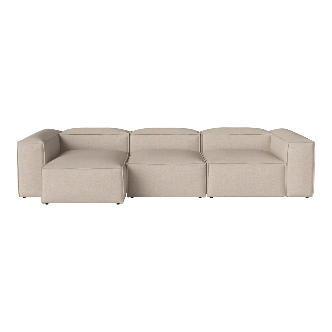 Beige modular sofa with a minimalist design and clean lines, featuring a smooth fabric texture.