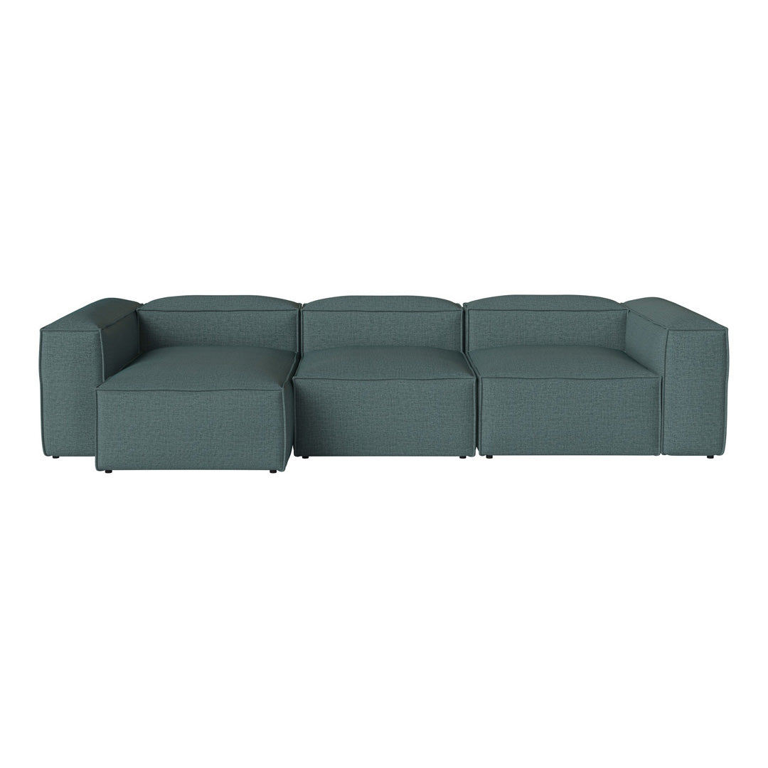 Stylish L-shaped sectional sofa in a deep teal color with a smooth, textured fabric finish. Perfect for modern decor.