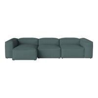Stylish L-shaped sectional sofa in a deep teal color with a smooth, textured fabric finish. Perfect for modern decor.