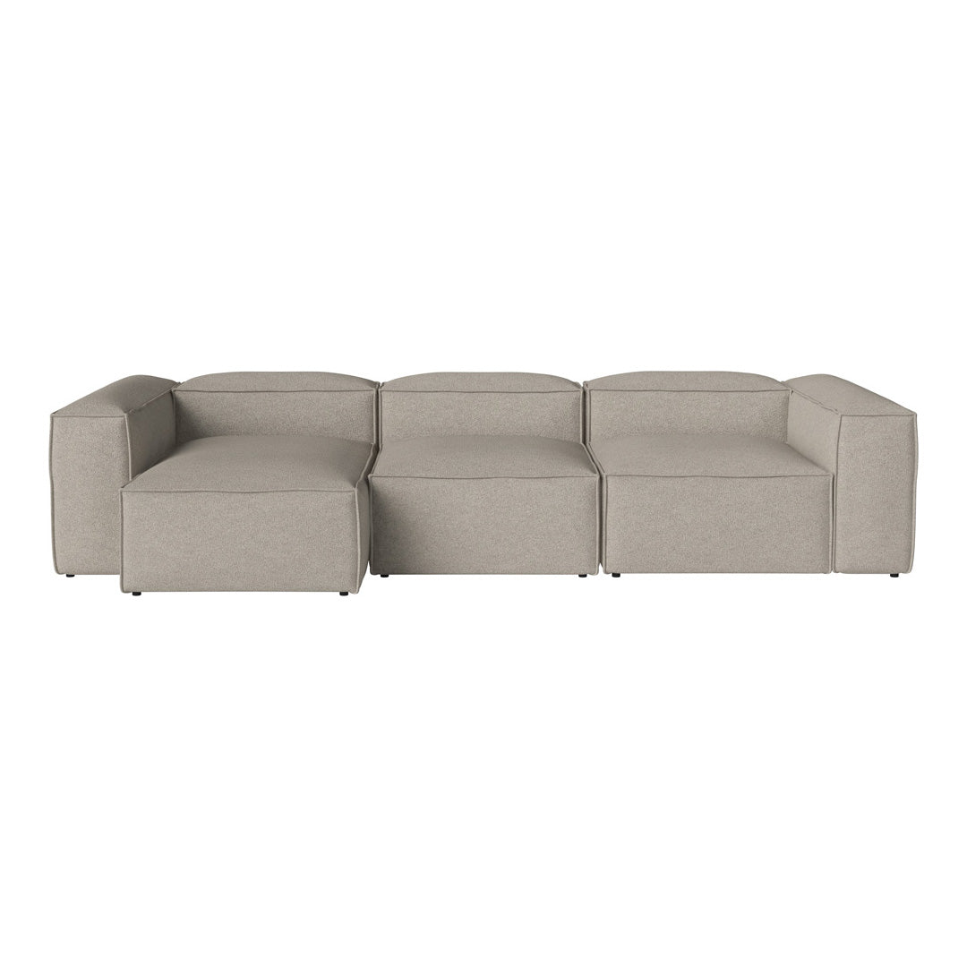"Light gray modular sofa with a modern, minimalist design and smooth, textured fabric."