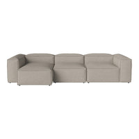 "Light gray modular sofa with a modern, minimalist design and smooth, textured fabric."