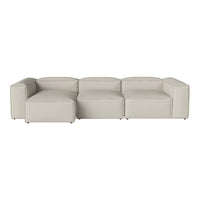 Beige modular sofa with a minimalist design and smooth, solid fabric pattern. Ideal for modern living spaces.