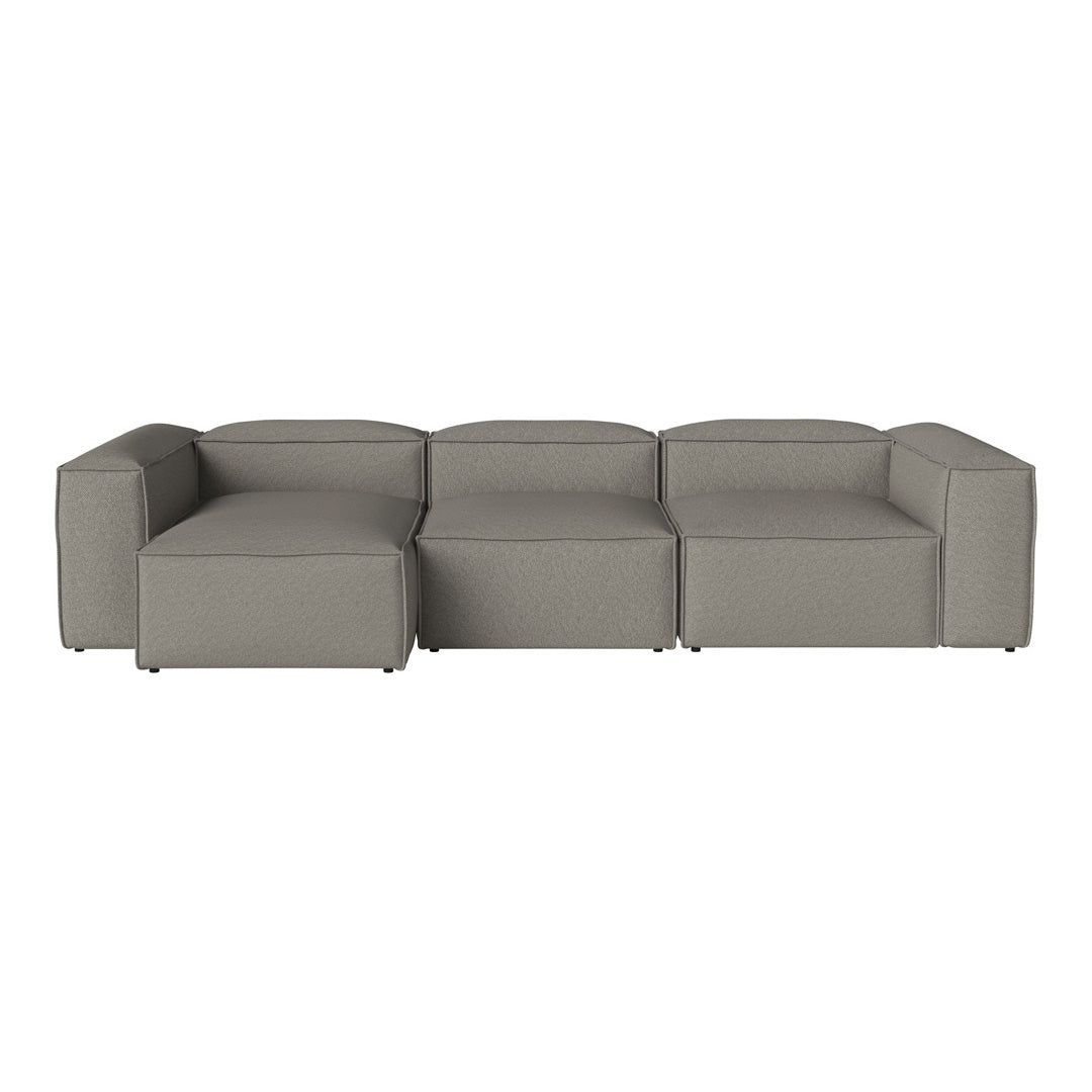 Gray modular sofa with a minimalist design and smooth texture, perfect for modern living spaces.