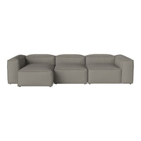 Gray modular sofa with a minimalist design and smooth texture, perfect for modern living spaces.