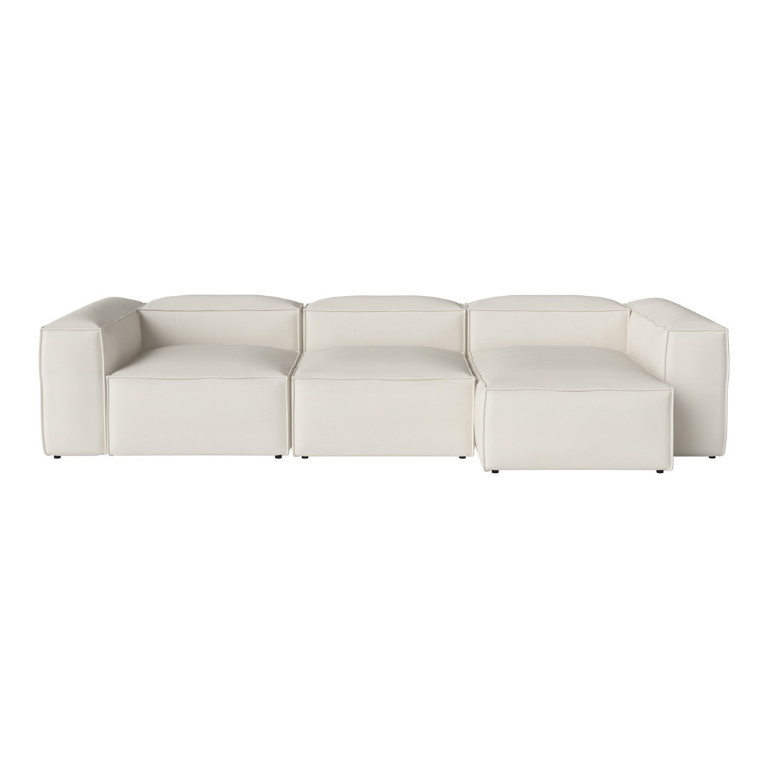 "Modern white sectional sofa with a minimalist design, featuring clean lines and a smooth textured fabric."