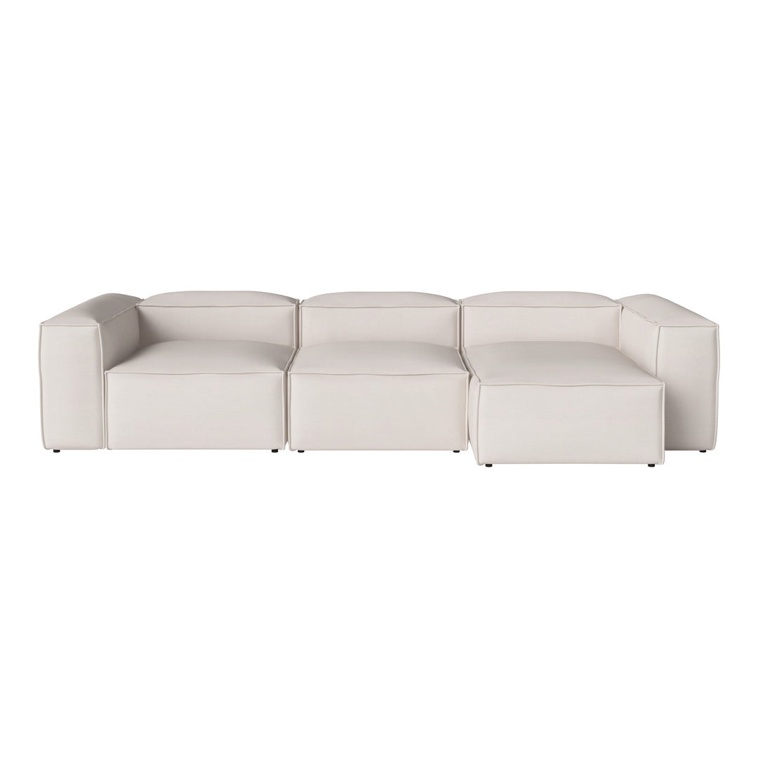 Modular sofa in soft white upholstery, featuring clean lines and a minimalist design for a modern aesthetic.