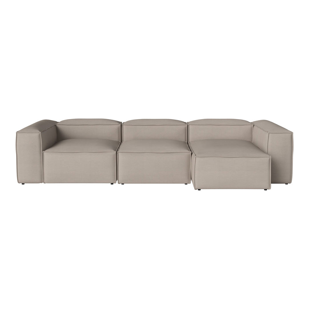 "Light beige modular sofa with a smooth, textured fabric and minimalist design."